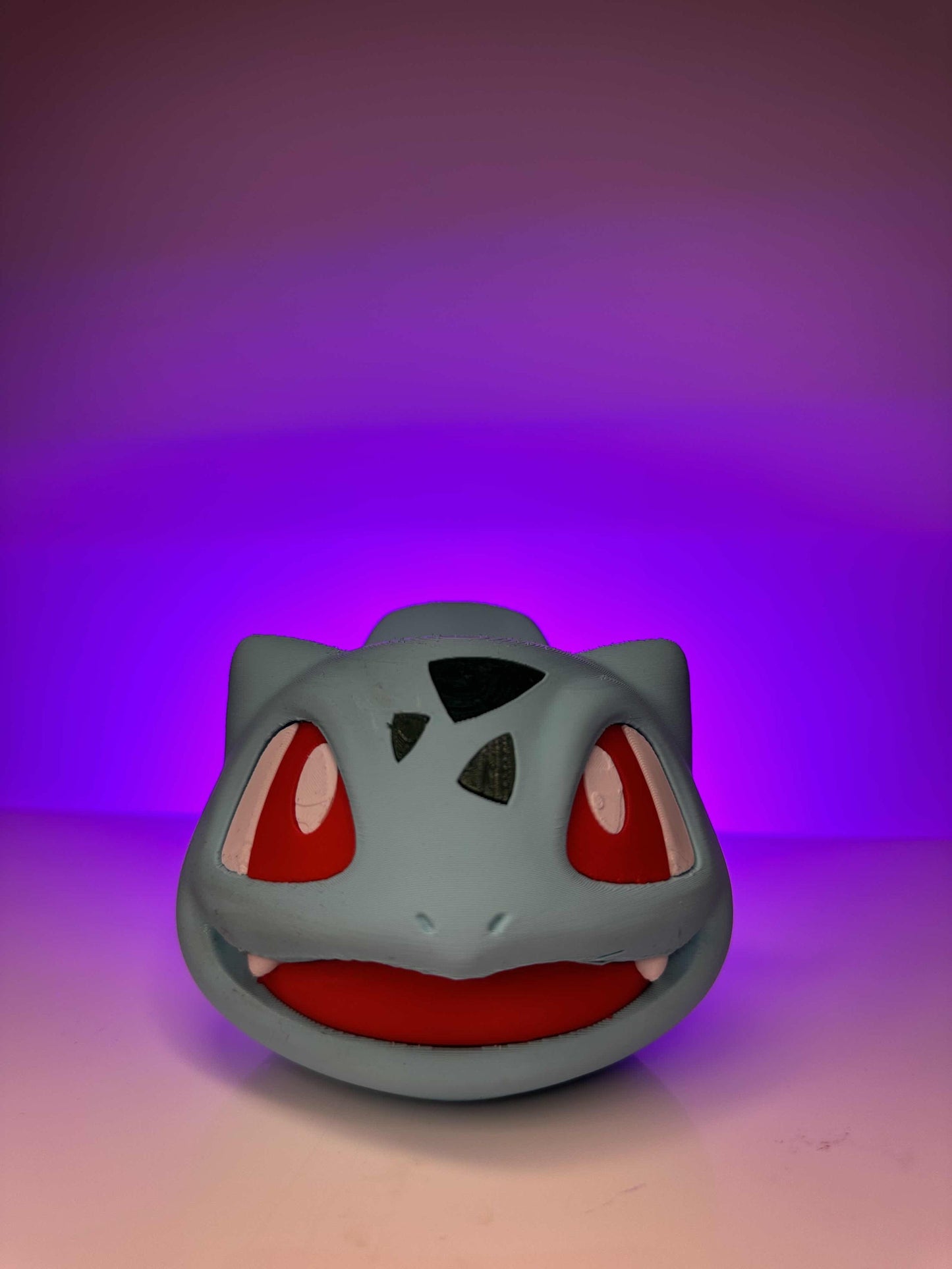 Pokémon's Bulbasaur controller holder fits all sized controllers NOT ASSOCIATED with Pokémon