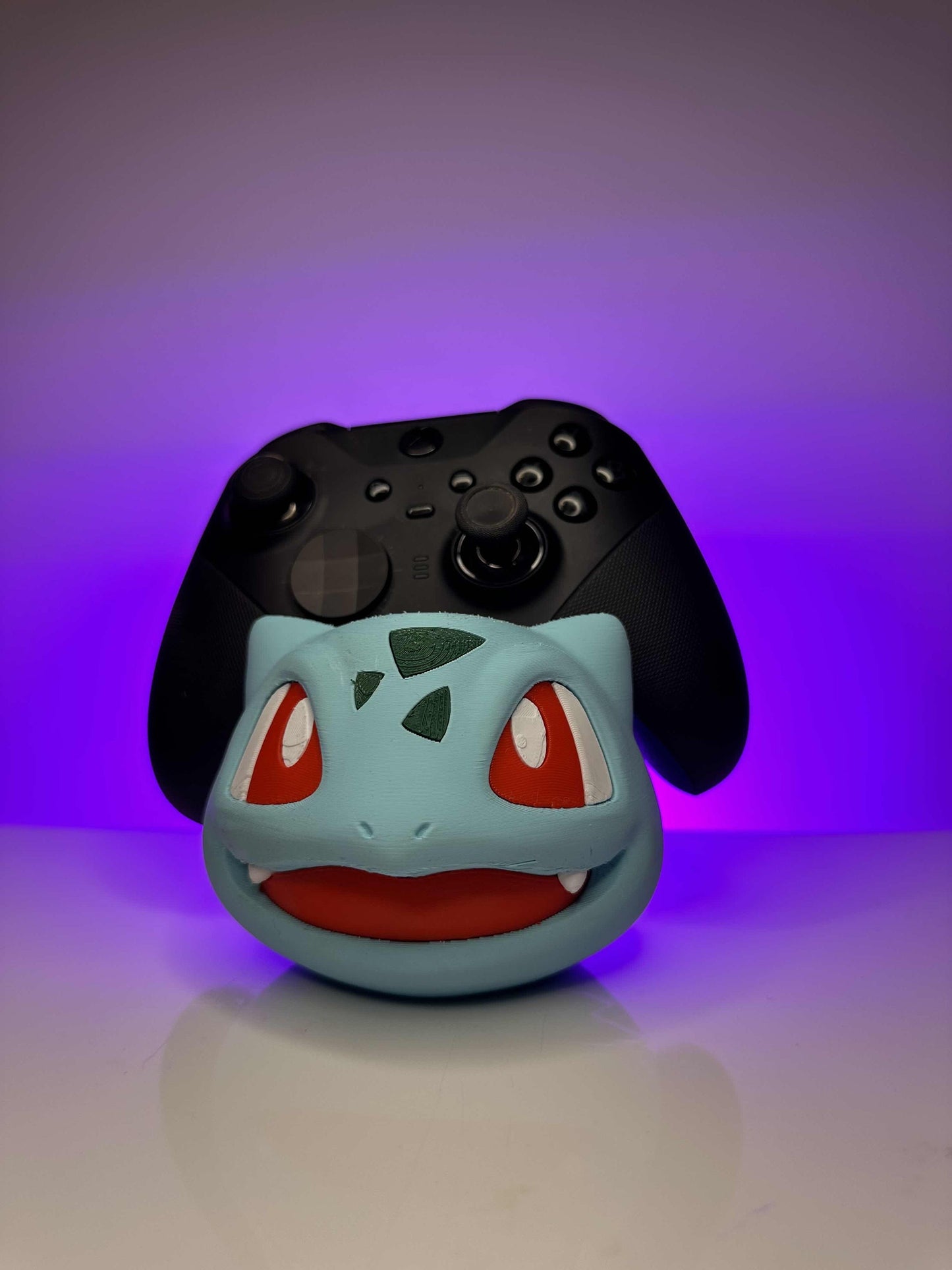 Pokémon's Bulbasaur controller holder fits all sized controllers NOT ASSOCIATED with Pokémon